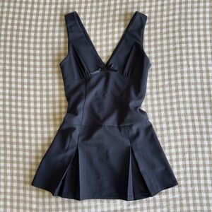 open lace back dress Motel Panolia Bow Front Pleat Mini Dress in Black and White